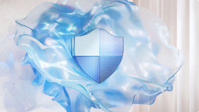 A white surface with blue and black spots.