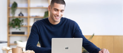 A man looking at a laptop.