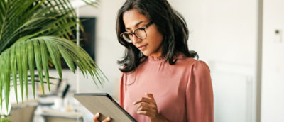 women looking at tab