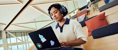 A women working on the laptop.