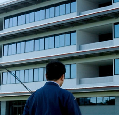 A man looking at the building