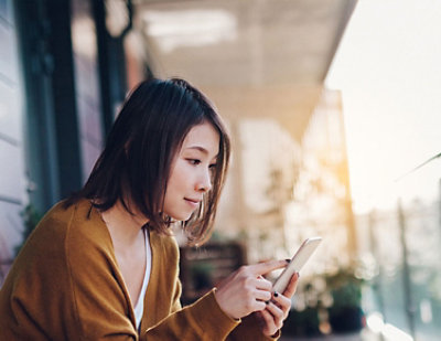 Woman looking at her phone.