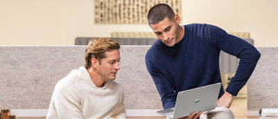 A person looking at a laptop.
