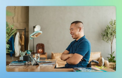 A man looking at a laptop