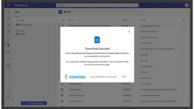 A screenshot of a computer screen displaying the message Download blocked and the logo CONTOSO.