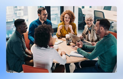 A group of people sitting around a table.