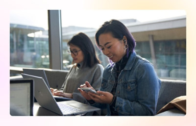 Person working at desk with desktop monitor
