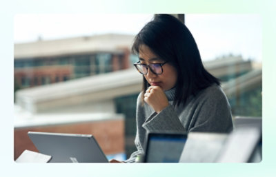 A woman working on a laptop