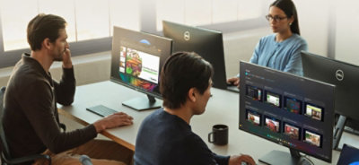 Three employees working in office.