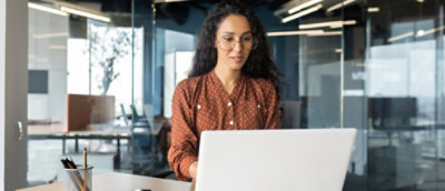 A woman working on laptop