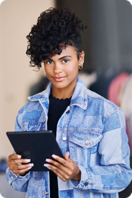 A woman holding a tablet