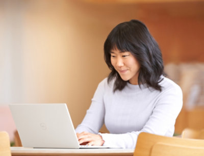 A person using a laptop.