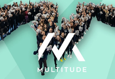Group forming a company logo shape together