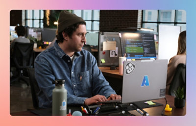 A man working with laptop.