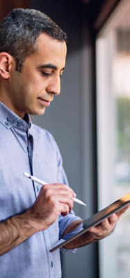 Professional writing on digital tablet