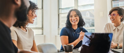 A group of people sitting at a table.