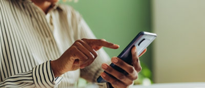 A man using a mobile.