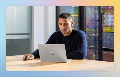 A man looking at a laptop.