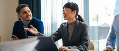 A mena nd women working on a laptop