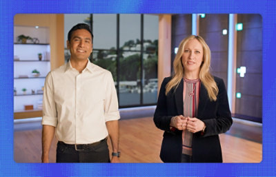 A men and women standing Infront of camera.