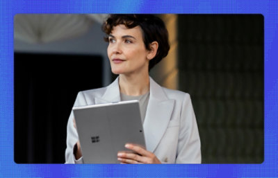 A person holding a tablet.