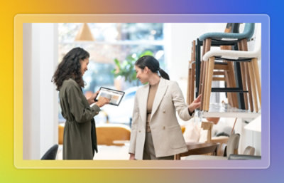 Three employees discussing.