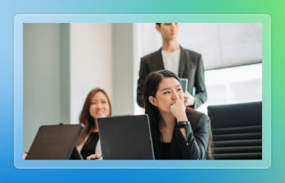  Team members listening during a meeting with laptops.