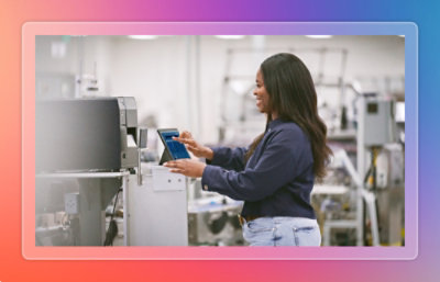 A person holding a tablet.