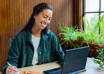 A woman working on laptop.
