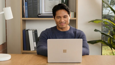 A person working on laptop.