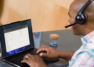 A man working on laptop.