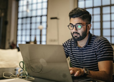 A man working on laptop.