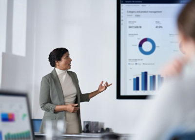 Presenter explaining charts on a data dashboard