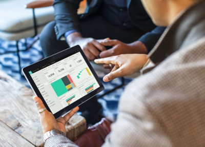 A person working on tablet.