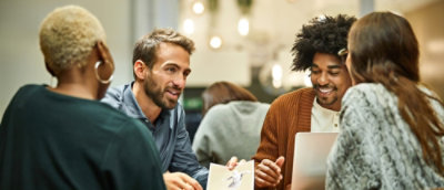 A group of employees discussing.