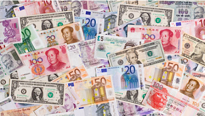 Colorful banknotes from different countries.
