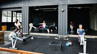 Athletes working out inside and outside a gym.