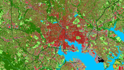 A multicolored aerial view of an urban area.