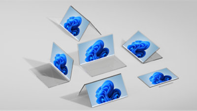 Les nouveaux ordinateurs portables pliables de Huawei sont présentés sur fond gris.