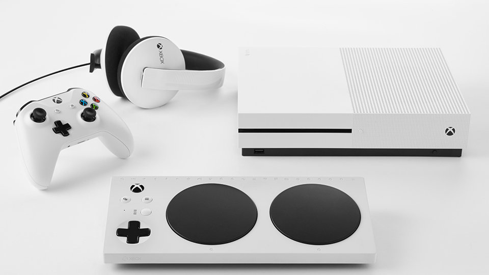 Xbox Adaptive Controller, Xbox One, Xbox Wireless Controller, and headphones.