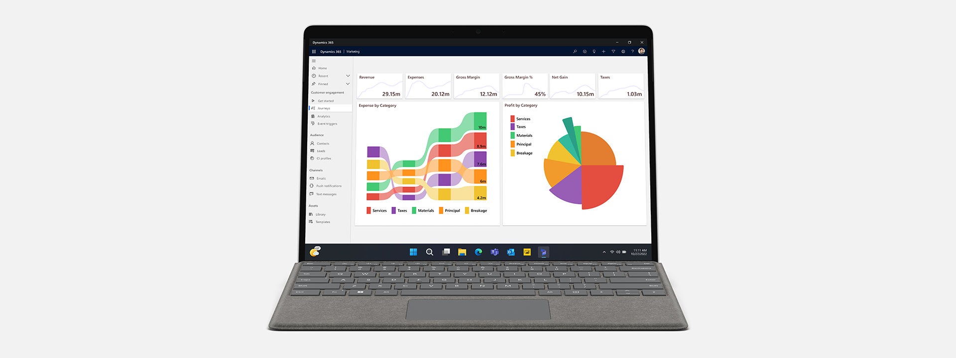 Surface Pro 9 for Business with Microsoft Dynamics 365 on the screen. 