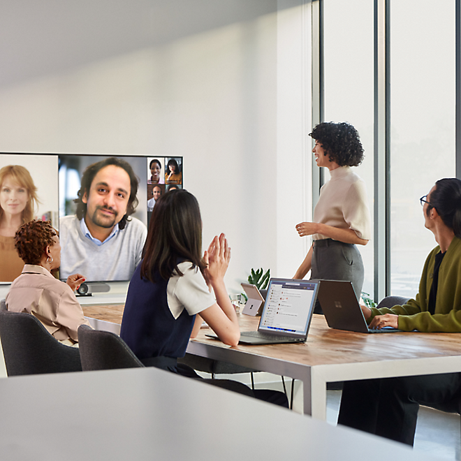 A group of people in a meeting
