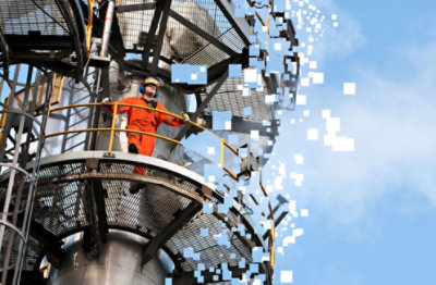 A person standing on top of a telecommunications tower