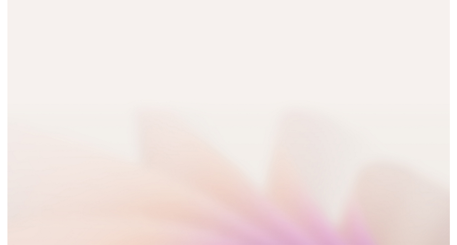 Imagen de foco suave de colores pastel, que sugiere formas florales de color pastel borrosas en tonos rosas y blancos.
