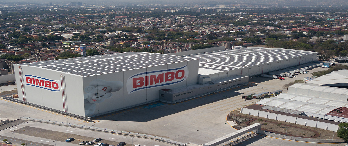 En stor byggnad med Bimbo-logotyp