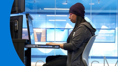 A person sitting at their desk working.