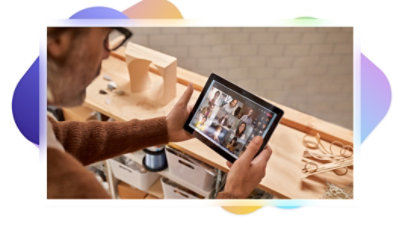 A Teams video call and a one-touch join device.