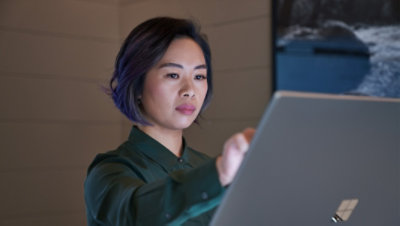 A person using a touchscreen Windows device