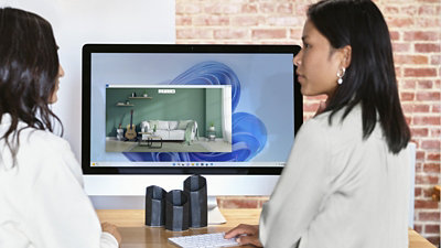 A person using Windows 365 at their desk