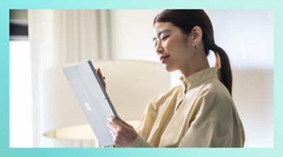 A person using a Surface and pen.